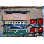 French Hornby SNCF green brake coach, Wagons-Lits coach bolster wagon (in poor box) and 2x red/black