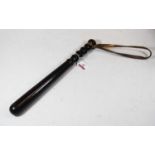 A Victorian turned hardwood policeman's truncheon with leather strap, length 38cmCondition report: