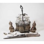 A Victorian silver plated 6 bottle cruet stand of scalloped circular form with pierced decoration,