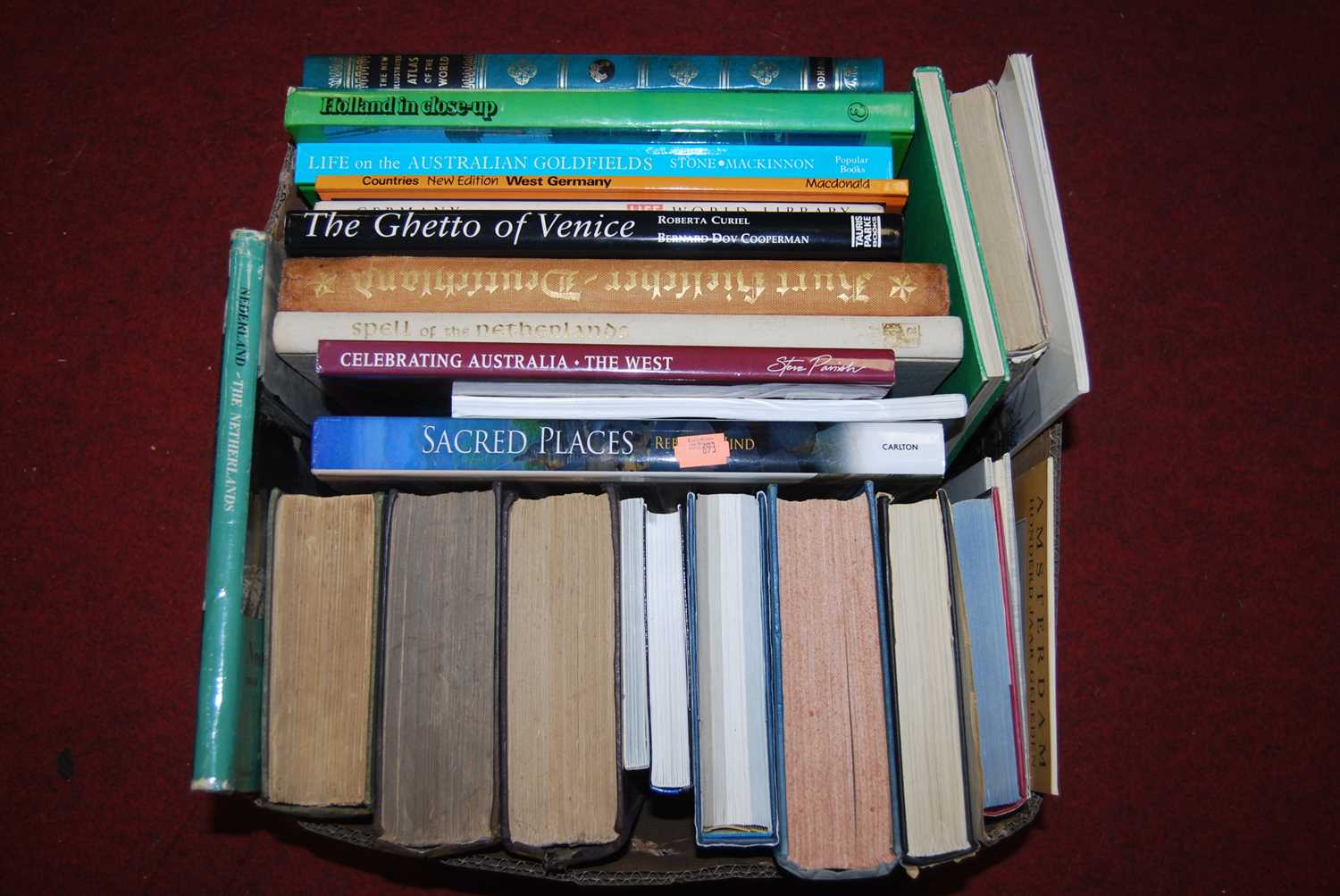 A large collection of miscellaneous hardback and other books, mainly being travel related examples