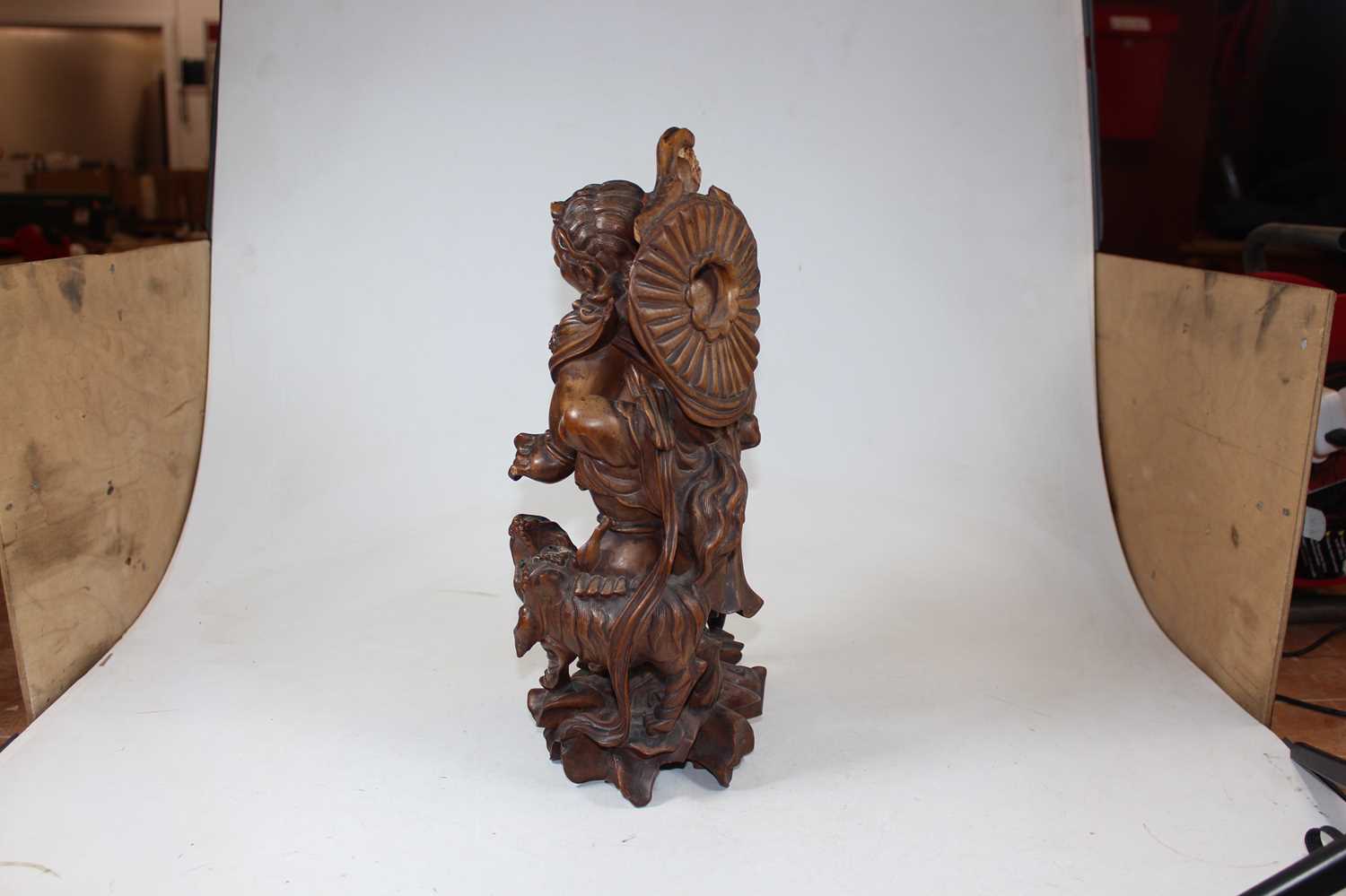 An early 20th century carved wood figure of a gentleman, probably Taisho period, shown standing with - Image 5 of 10