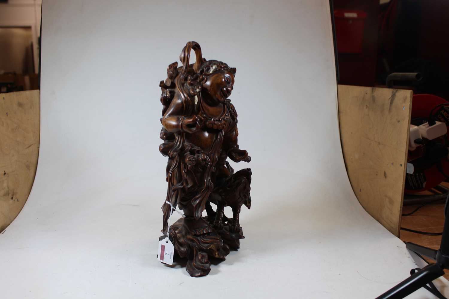 An early 20th century carved wood figure of a gentleman, probably Taisho period, shown standing with - Image 2 of 10