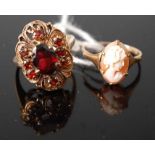 Two rings, comprising a 9ct yellow gold and garnet cannetille cluster ring, having a centre oval and