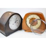 A 1950s oak cased mantel clock; together with two others (3)