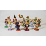 A large collection of Halcyon Days porcelain ornaments, to include Teddy-bear Orchestra figures,