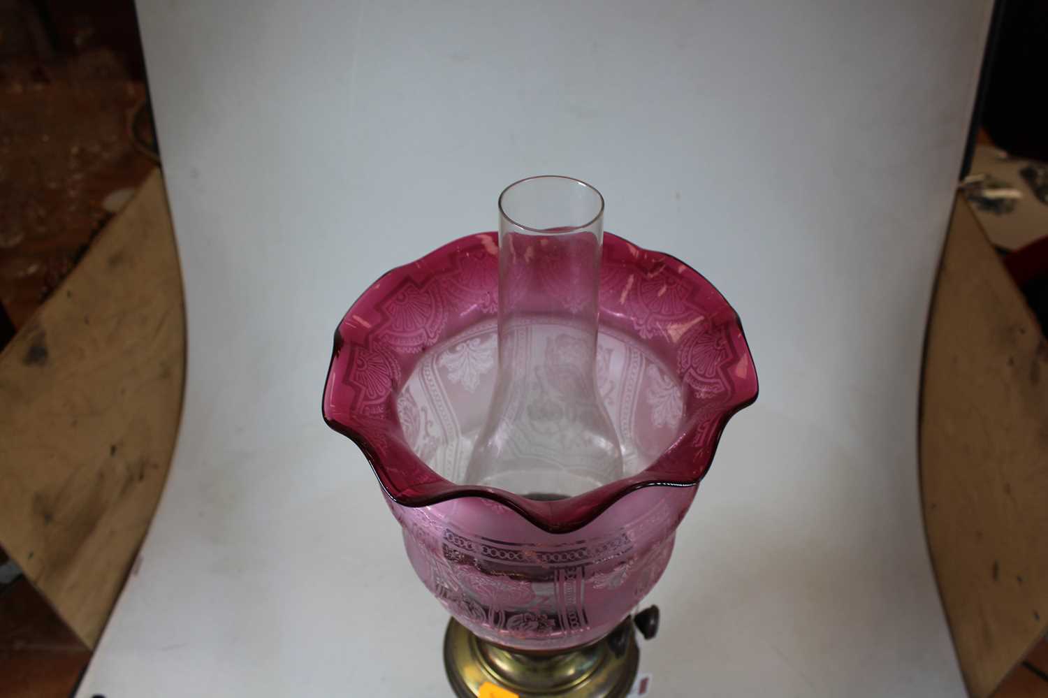 A Victorian brass oil lamp, with acid etched cranberry glass shade, h.51cmCondition report: Shade - Image 5 of 5
