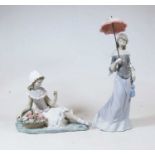 A Lladro Spanish porcelain figure of a girl with parasol, printed mark verso, h.33cm; together
