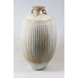 A reproduction Chinese white crackle glazed earthenware vase, of ovoid form with flared rim, sold