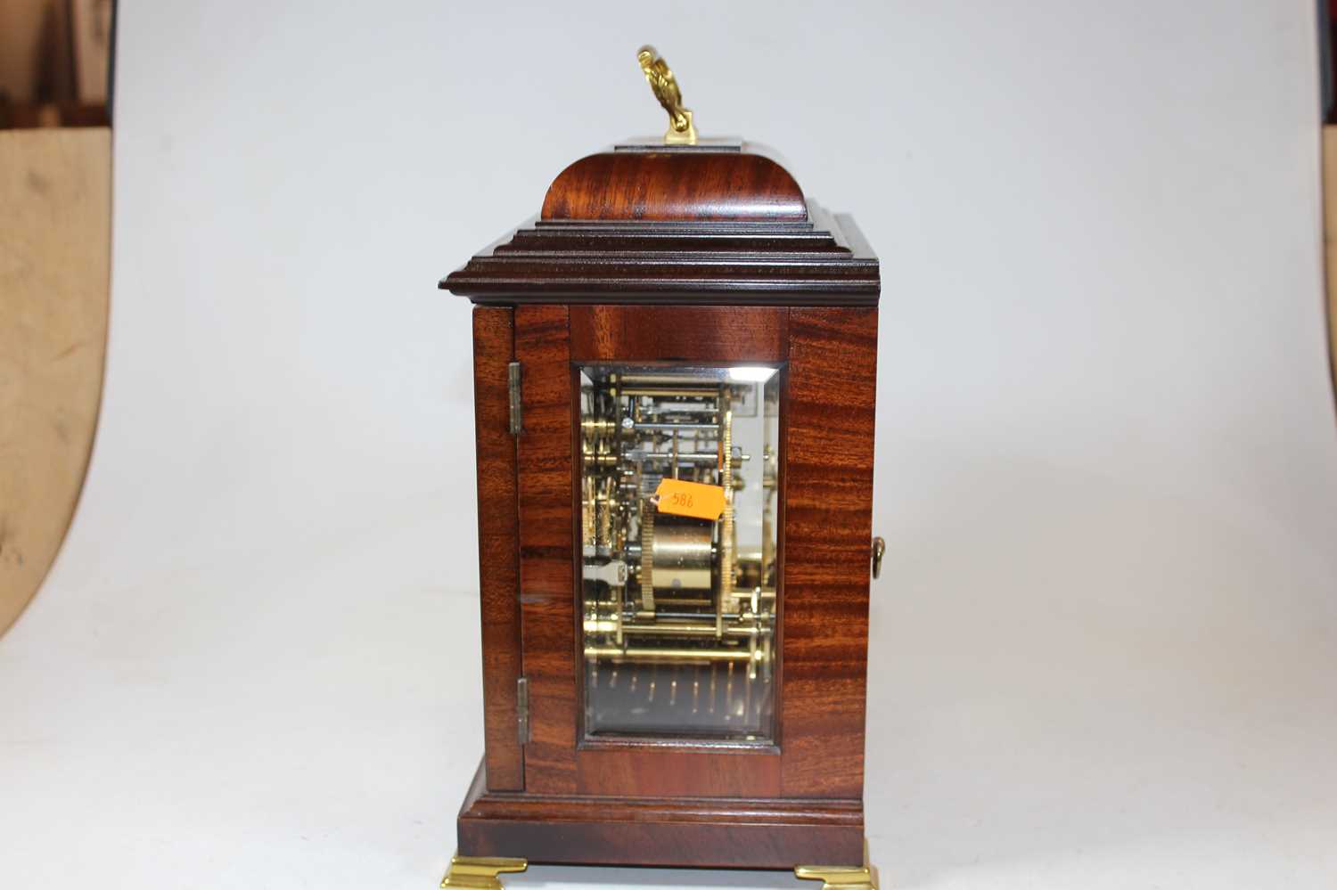 An 18th century style walnut bracket clock, the silvered chapter ring showing Roman numerals, the - Image 8 of 8