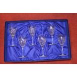 A boxed set of six Royal Doulton finest crystal wine glasses