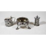 A Victorian silver open salt, of squat circular form, having repousee decoration and on cast