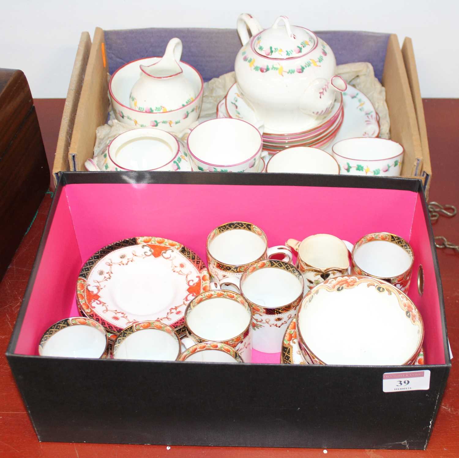 An early 20th century Sutherland porcelain part coffee service, together with another porcelain part