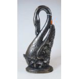 A 20th century polished steel door stop, in the form of a swan, height 39cm