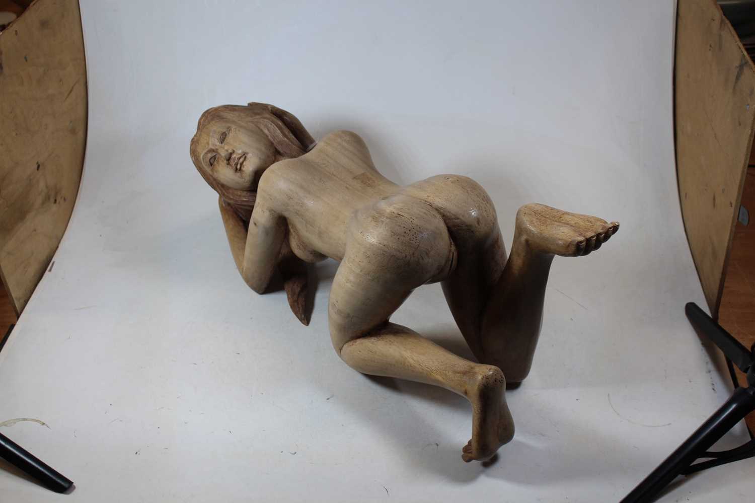 An Eastern carved hardwood figure of a nude woman, shown on all fours, h.22cm - Image 2 of 4