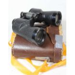 A pair of Saratoga Swift 8x40 binoculars, model No.8014, in leather case
