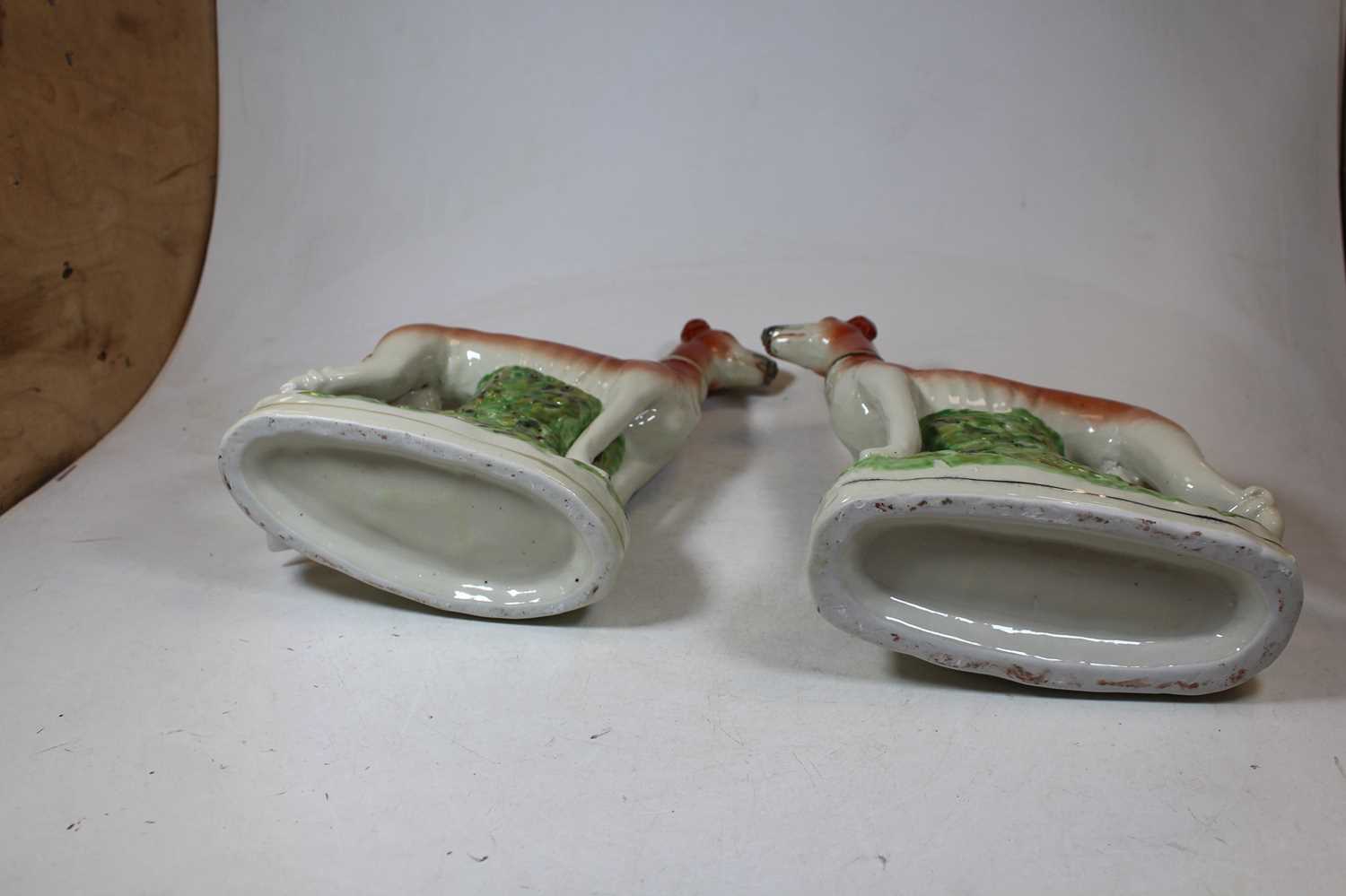 A pair of reproduction Staffordshire pottery models of greyhounds, 20th century, h.27cmCondition - Image 2 of 4