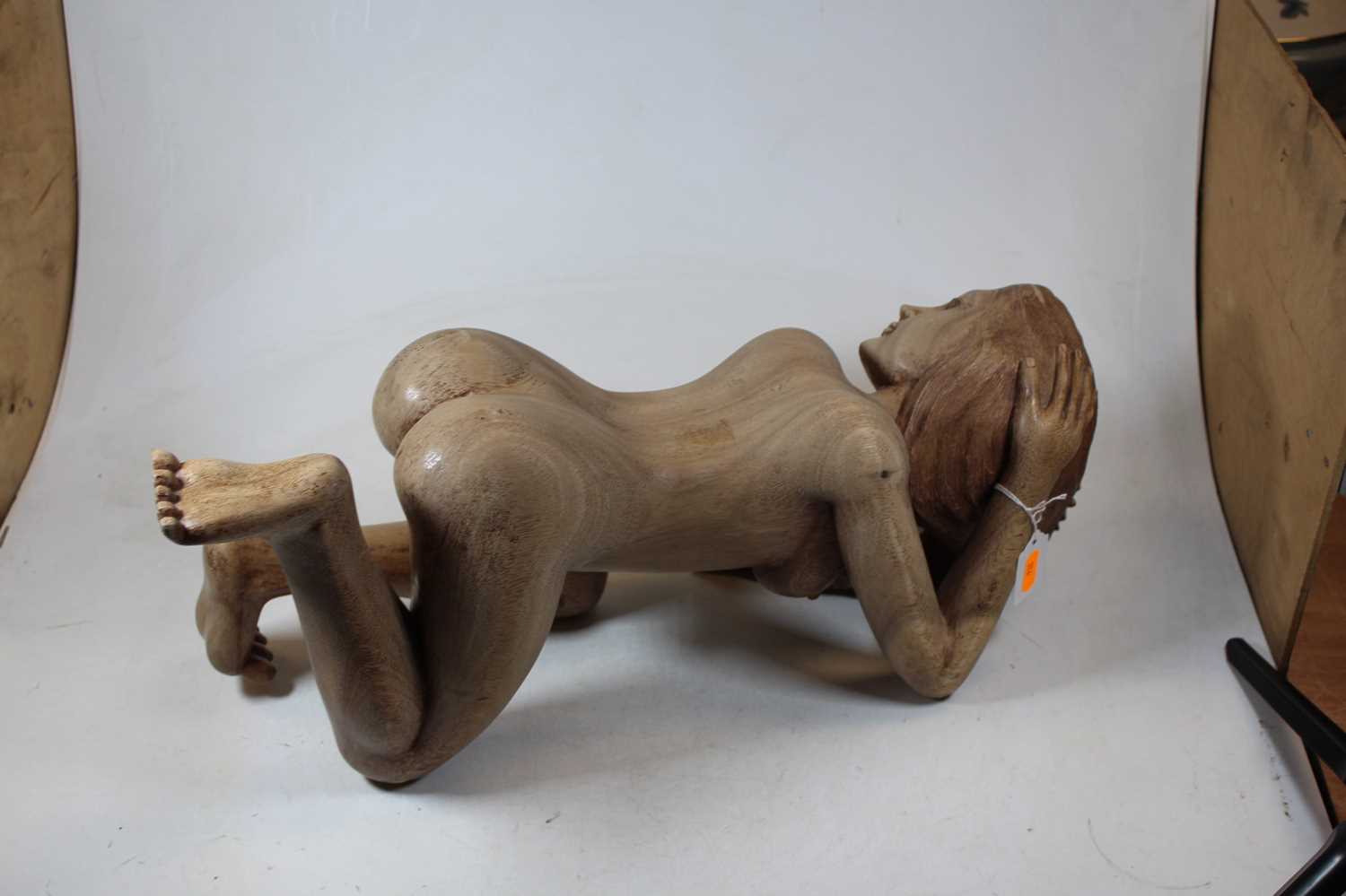 An Eastern carved hardwood figure of a nude woman, shown on all fours, h.22cm - Image 3 of 4