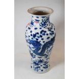 A Chinese export blue & white porcelain vase, of baluster form, decorated with a four clawed dragon,