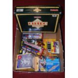 A collection of toys and games, to include a Kit Connection battery operated road racing set,