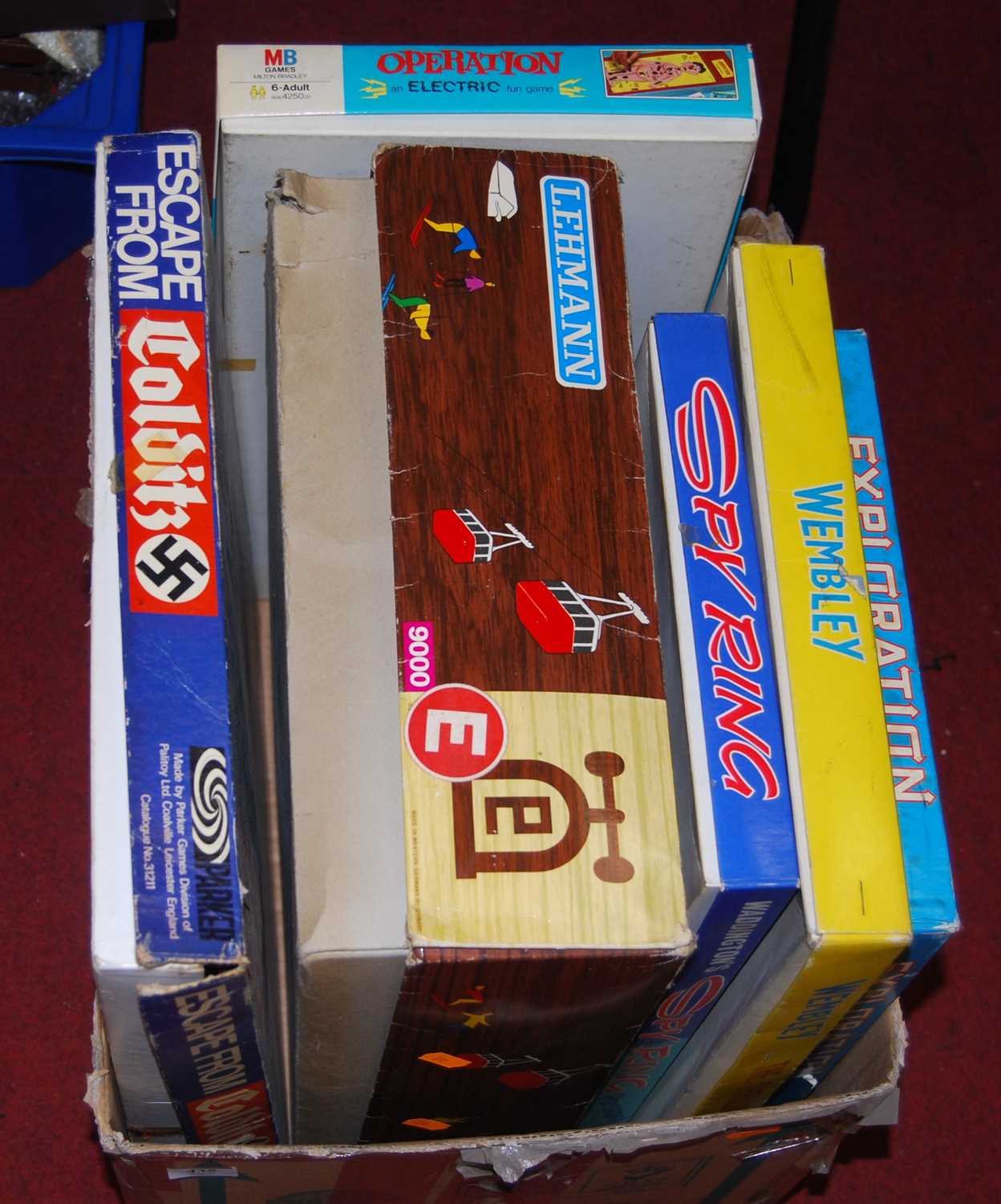 A box of children's games, to include Escape from Colditz, Operation, Wembley etc