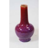 A Chinese export flambe glazed vase, the cylindrical neck above a globular body, apocryphal four