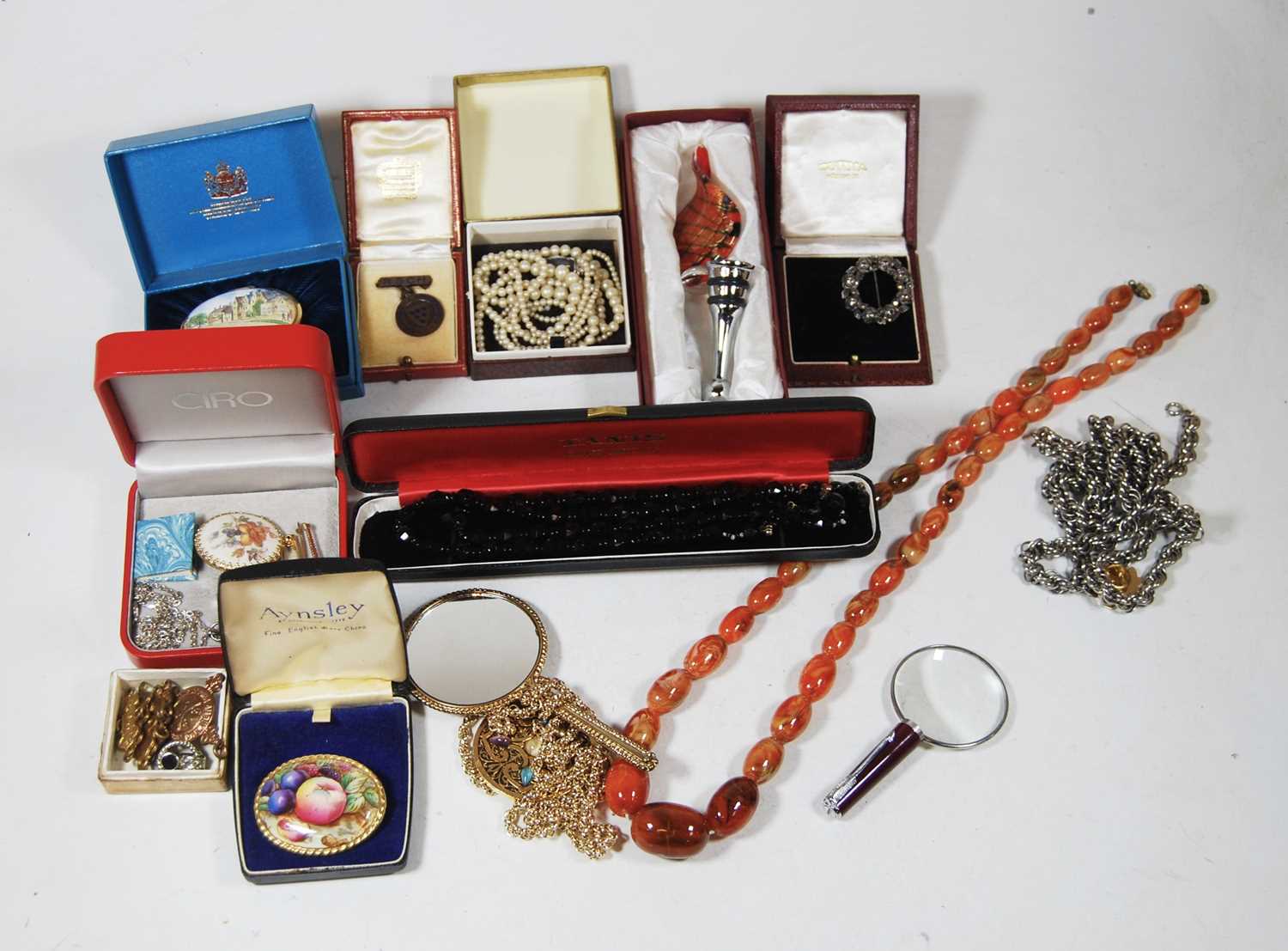 A collection of miscellaneous items. to include a boxed Halcyon Days enamelled pill box, an