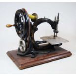 A Wilcox & Gibbs 'Automatic' silent sewing machine, the chromed plate stamped Wilcox & Gibbs