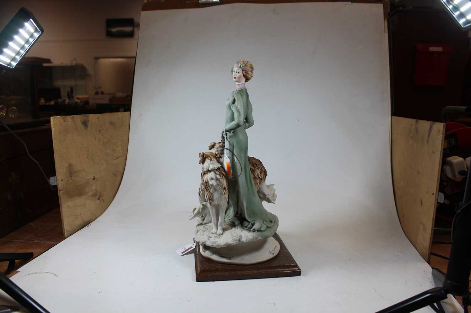 An Italian bisque figure of a Lady with two dogs by Giuseppe Armani, mounted on a moulded wooden - Image 3 of 8