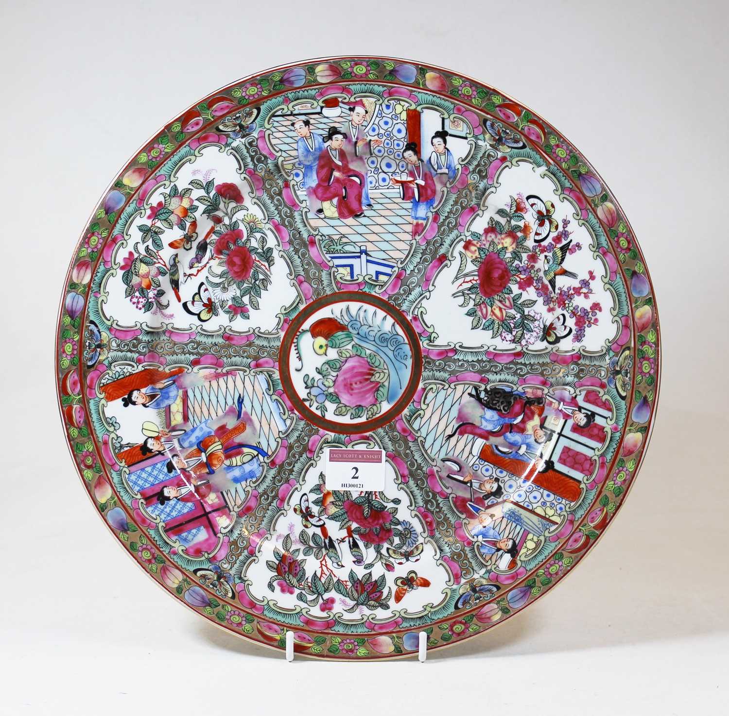 A 20th century Chinese Canton porcelain charger, decorated with flora, fauna and figures in an