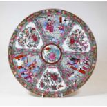 A 20th century Chinese Canton porcelain charger, decorated with flora, fauna and figures in an