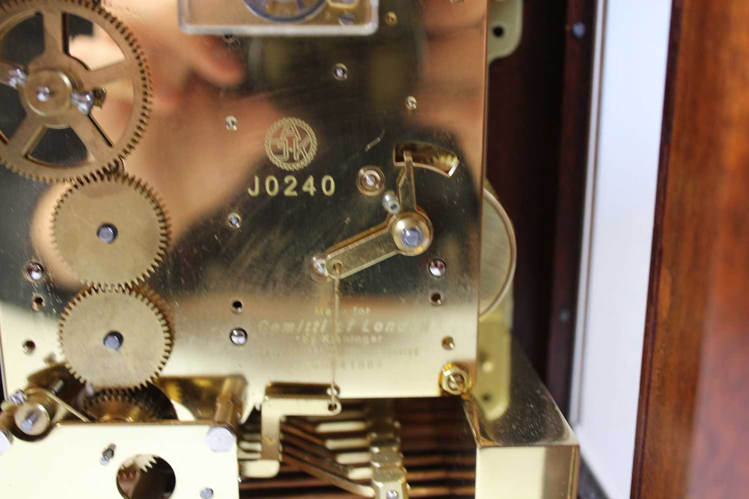 An 18th century style walnut bracket clock, the silvered chapter ring showing Roman numerals, the - Image 7 of 8