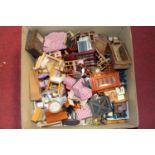 A box of miscellaneous dolls house furniture to include bowfront display cabinet, double door