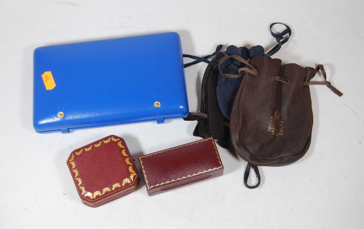 A small collection of empty leather jewellery boxes and pouches, to include Garrard's