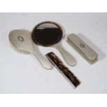 A 20th century lady's five-piece dressing table set, to include hand brush, hand mirror, clothes