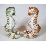 A collection of four Royal Crown Derby desk ornaments, to include Swirl Seahorse, Spot Seahorse,