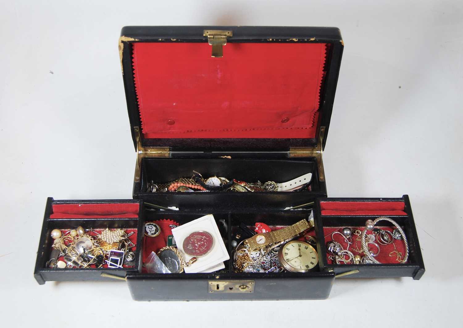 A leather clad jewellery box and contents, to include a lady's white metal ropetwist torque