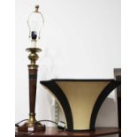 A 20th century turned beech and brass mounted table lamp with shade, h.84cmCondition report: