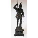 A 20th century lacquered bronze figure of a soldier, showing in standing pose and holding a pike and