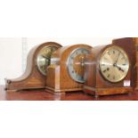 A 1930s oak cased eight day mantel clock, h.20cm; together with another 1930s oak mantel clock by