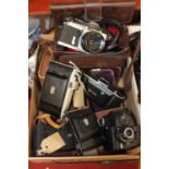 A box containing a collection of early 20th century cameras, to include a Zeiss Ikon, an Ensign