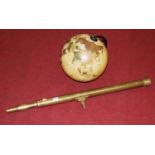 A reproduction brass telescope; together with a Legend 12" terrestrial globe (2)