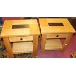 A pair of contemporary light oak single drawer two-tier lamp tables, width 58cm
