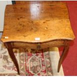 A French provincial joined fruitwood low serpentine single drawer side table, width 54cmCondition