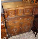 An early 20th century floral relief carved and joined oak court cupboard, width 108.5cm