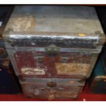 A pair of large aluminium and studded metal bound trunks, with annotations, w.100cm