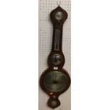 An early 19th century rosewood onion topped four dial wheel barometer, the lower silvered dial