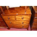 An early Victorian mahogany square front chest of two short over two long drawers on splayed bracket