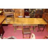 A good 17th century style joined oak dining suite comprising; draw-leaf refectory table having