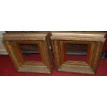A pair of late 19th century giltwood and composition picture frames, each with beaded and acanthus