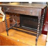 An early 20th century stained oak barley twist turned single drawer side table, width 76cm